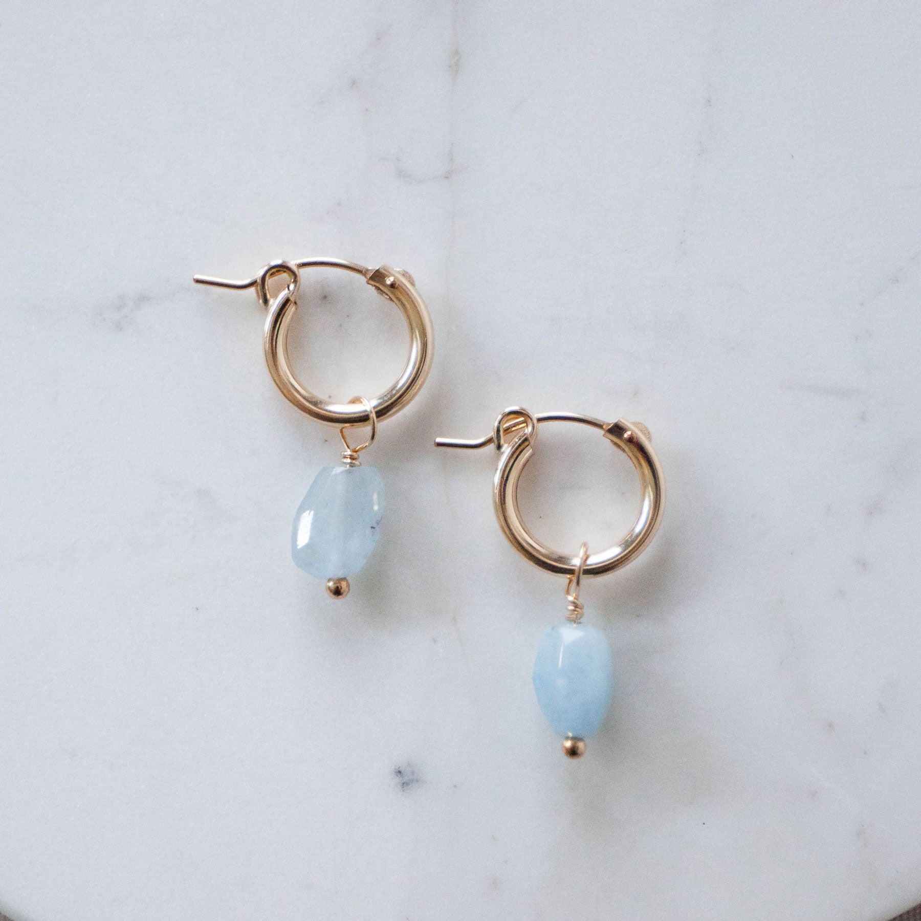 Aquamarine on sale huggie earrings