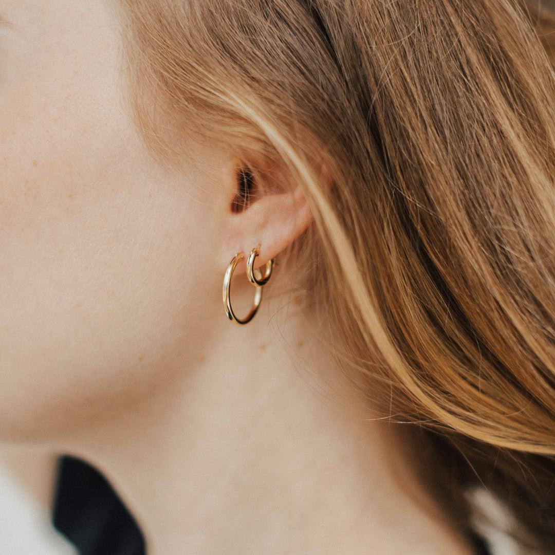 Shown wearing a 22mm and 12mm hoop.