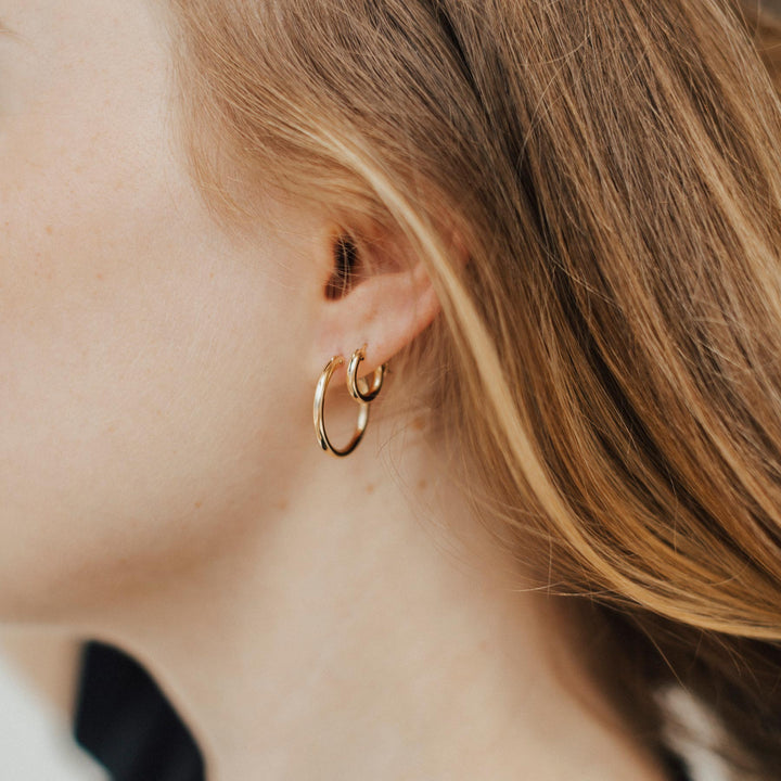 Shown wearing a 22mm and 12mm hoop.